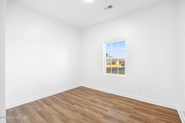 34 Bless Ave, Bolton, NC 28423 - empty room with wood finished floors and baseboards