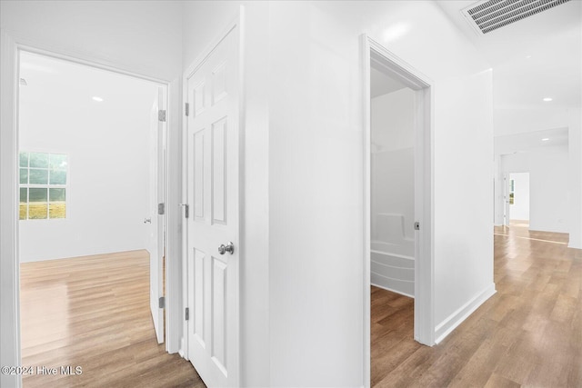 34 Bless Ave, Bolton, NC 28423 - hall featuring wood finished floors, recessed lighting, and baseboards