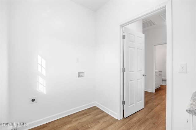 34 Bless Ave, Bolton, NC 28423 - clothes washing area with washer hookup, light wood-style floors, electric dryer hookup, and baseboards