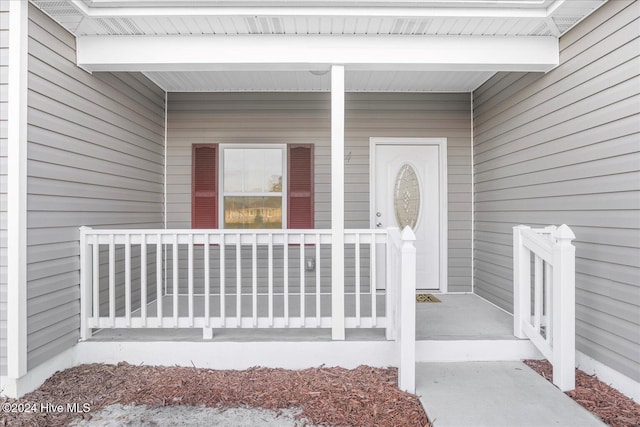 34 Bless Ave, Bolton, NC 28423 - property entrance featuring a porch