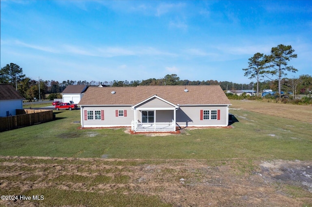 34 Bless Ave, Bolton, NC 28423 - back of house featuring a yard