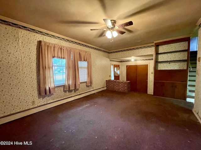 unfurnished bedroom featuring crown molding, a baseboard heating unit, carpet, and ceiling fan