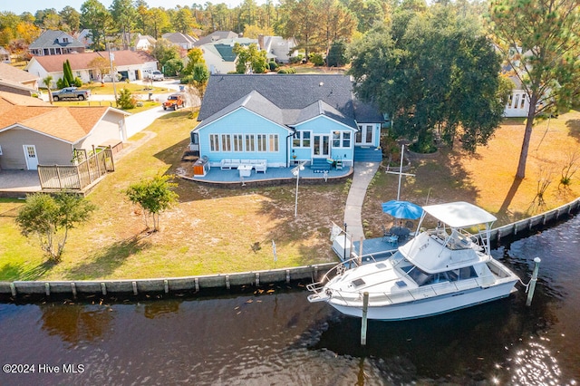 aerial view featuring a water view and a residential view