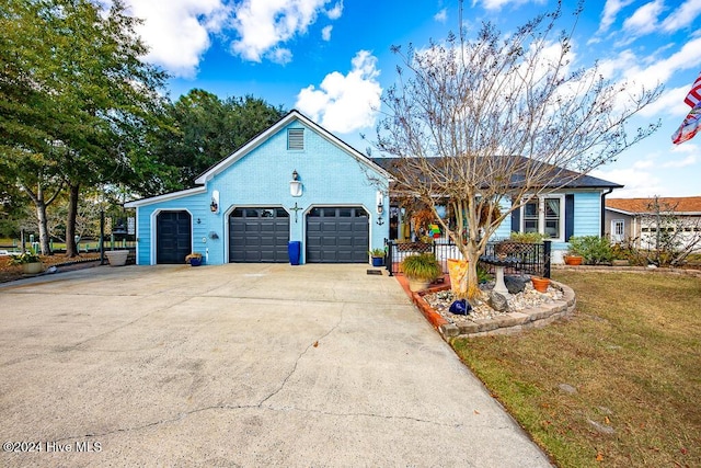 single story home with driveway, a garage, a front yard, a porch, and brick siding