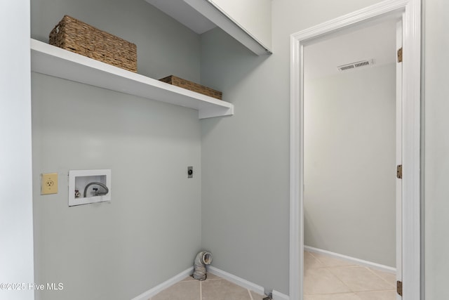 laundry room with light tile patterned floors, laundry area, visible vents, hookup for an electric dryer, and washer hookup