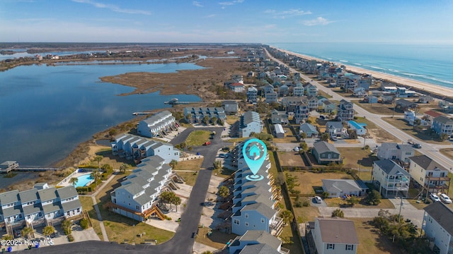 aerial view with a residential view and a water view