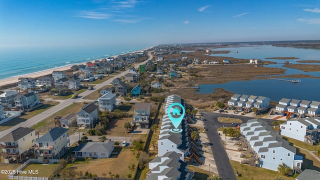 bird's eye view featuring a residential view and a water view