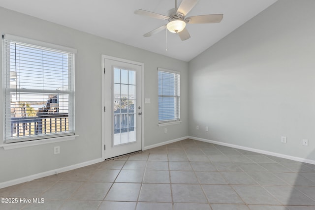 doorway to outside with lofted ceiling, ceiling fan, baseboards, and tile patterned floors