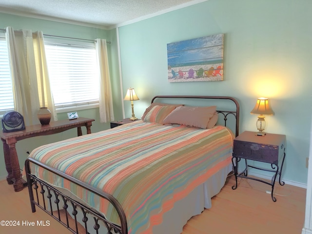 bedroom featuring a textured ceiling