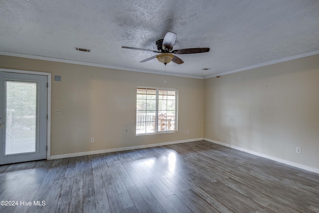 spare room featuring a textured ceiling, hardwood / wood-style flooring, ceiling fan, and crown molding