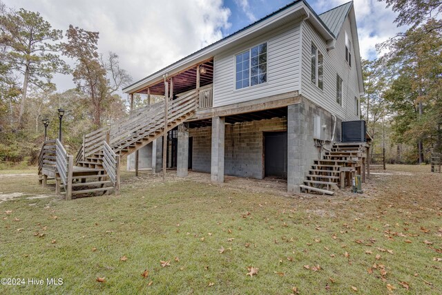 exterior space with a front yard and a deck