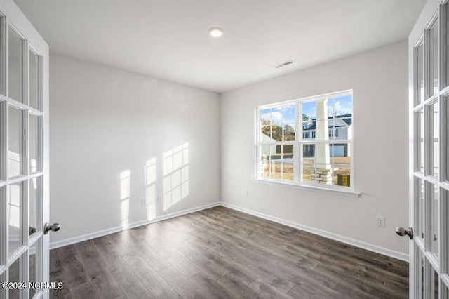 3057 Platinum Cir W, End, NC 27376 - empty room with french doors, dark wood-style flooring, baseboards, and recessed lighting