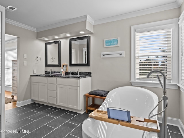 bathroom with vanity and ornamental molding