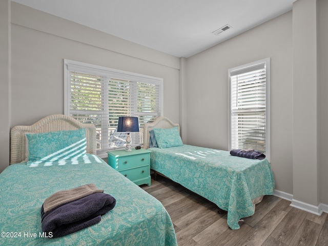 bedroom featuring hardwood / wood-style flooring