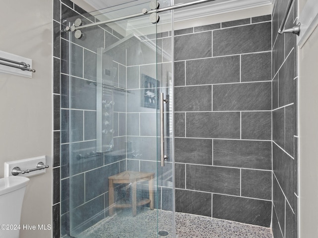 2610 Emerald Dr, Emerald Isle, NC 28594 - full bathroom with toilet, a shower stall, and crown molding