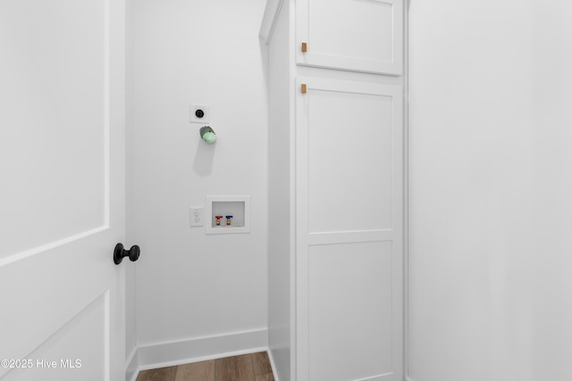 washroom featuring wood-type flooring, electric dryer hookup, and hookup for a washing machine