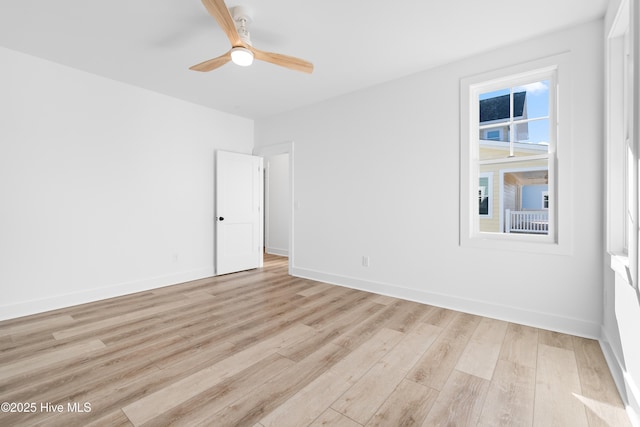 unfurnished room featuring ceiling fan and light hardwood / wood-style floors