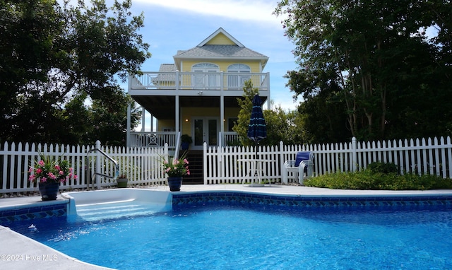 view of pool featuring a wooden deck