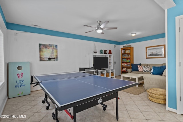 rec room featuring ceiling fan and light tile patterned floors