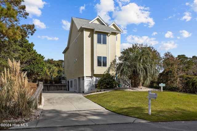 view of property exterior with a lawn