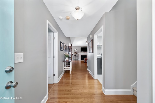 hallway featuring light wood-type flooring