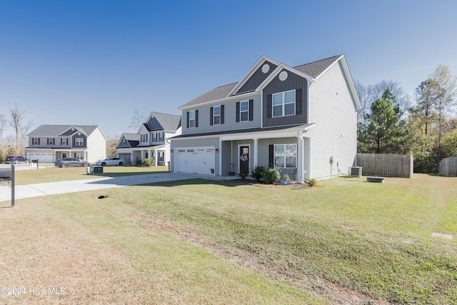 view of front facade with a front lawn, central air condition unit, and a garage