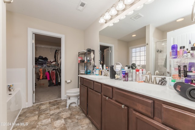 full bathroom with toilet, independent shower and bath, and vanity