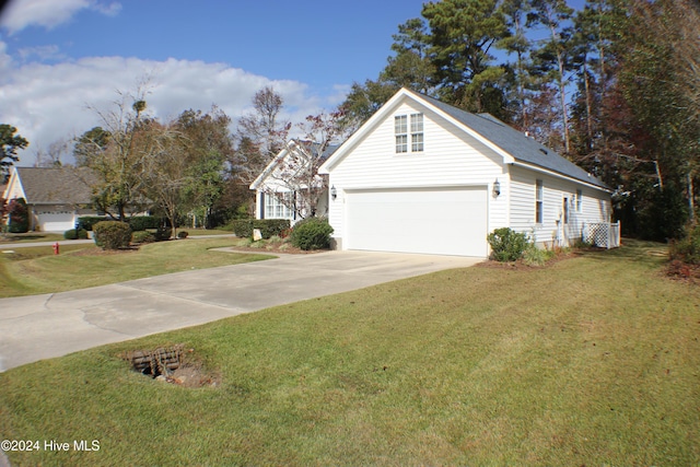 view of side of home featuring a yard