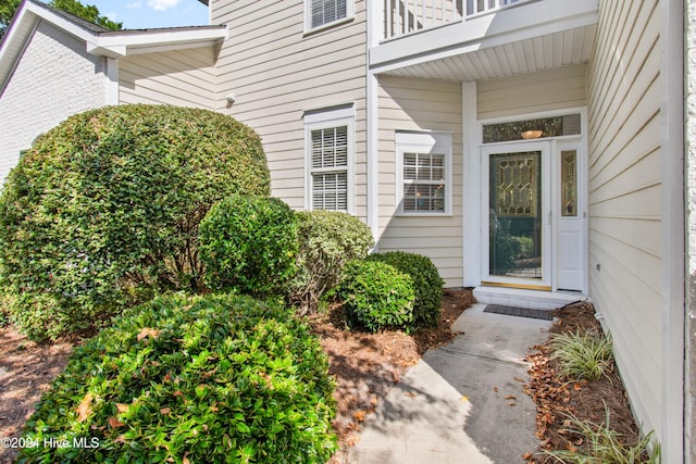 doorway to property with a balcony