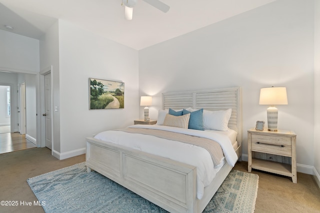 bedroom featuring a ceiling fan, carpet flooring, and baseboards