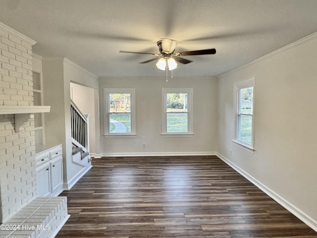 unfurnished living room featuring ceiling fan, crown molding, dark wood-type flooring, and built in features