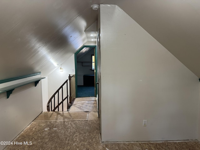 bonus room featuring vaulted ceiling