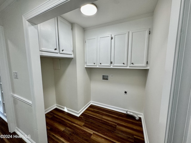 laundry area with cabinets, hookup for a washing machine, dark wood-type flooring, and electric dryer hookup