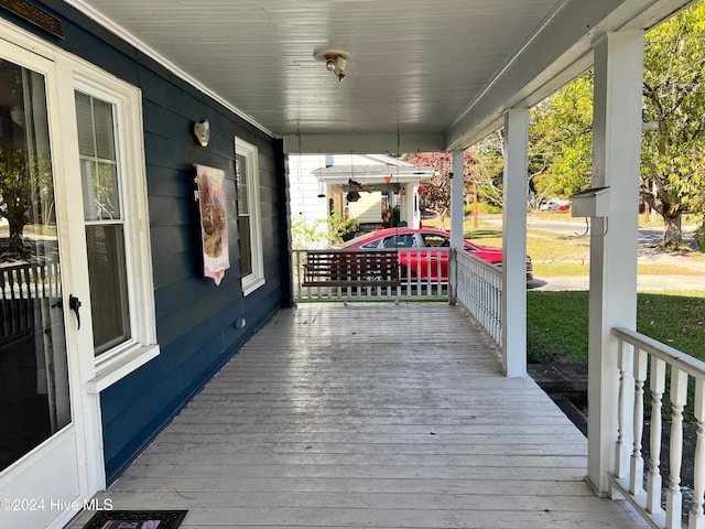 deck with covered porch