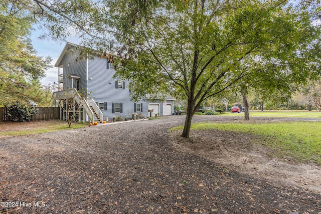 view of yard featuring a garage