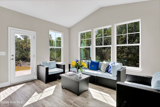 sunroom with lofted ceiling