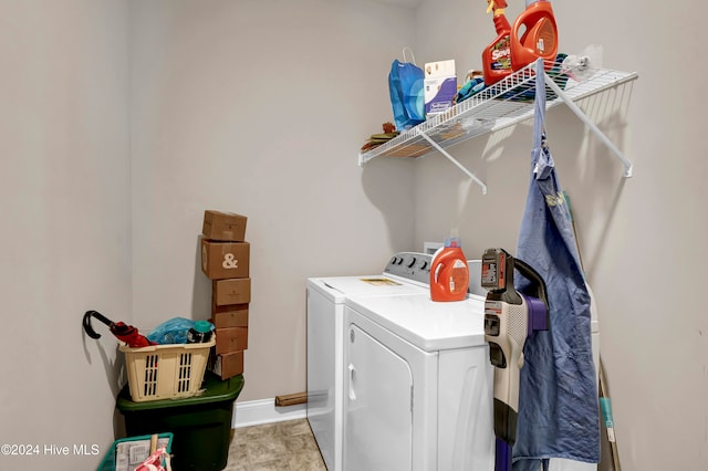 laundry room featuring separate washer and dryer