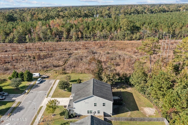 bird's eye view with a view of trees