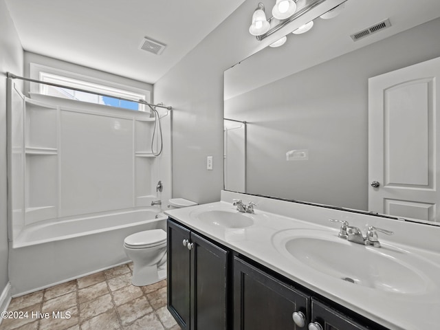 bathroom featuring a sink, toilet, and visible vents