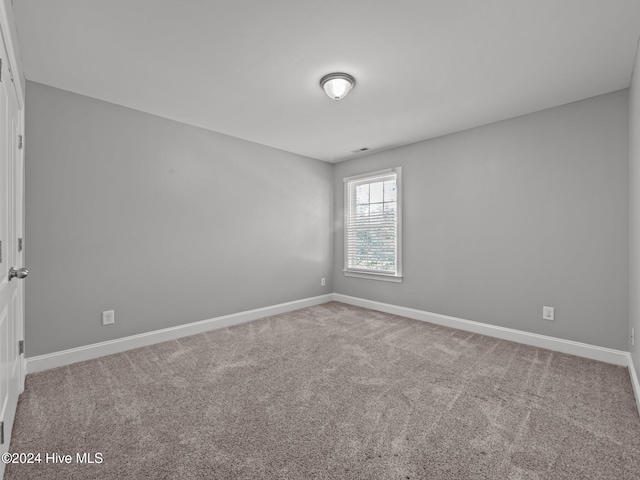 empty room with carpet floors