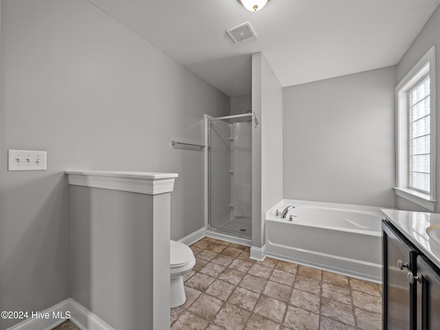 bathroom with a garden tub, toilet, a stall shower, visible vents, and vanity
