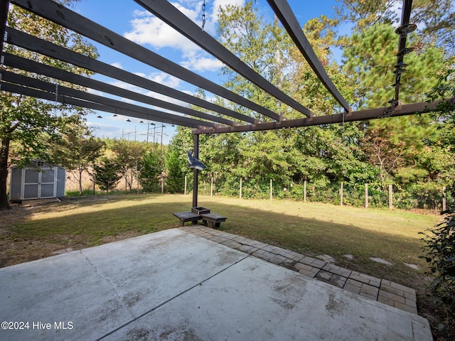 view of patio featuring a pergola, a storage shed, and an outdoor structure