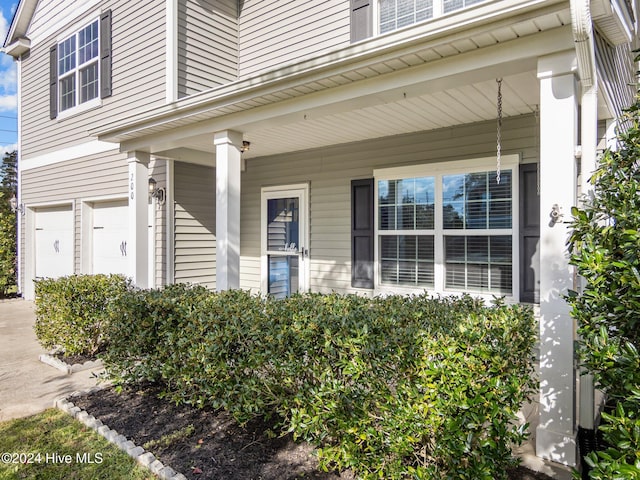 entrance to property with covered porch