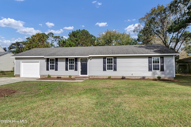 1912 Paulette Rd, Morehead City, NC 28557 - ranch-style house featuring an attached garage, concrete driveway, and a front lawn