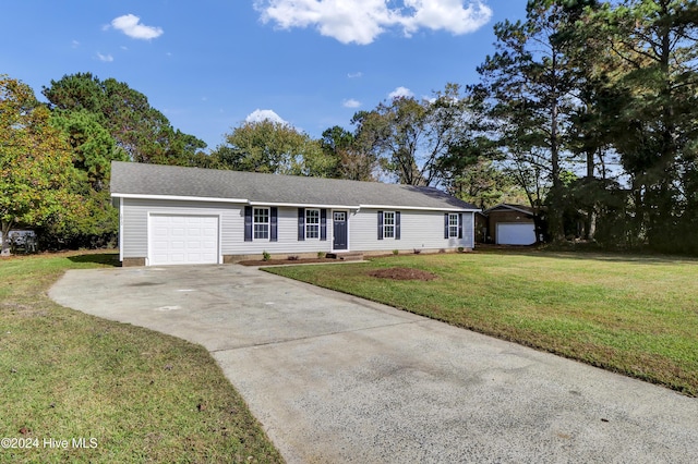 1912 Paulette Rd, Morehead City, NC 28557 - ranch-style house featuring an attached garage, concrete driveway, and a front lawn