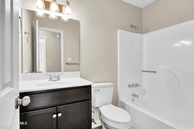 full bathroom with vanity, toilet, and shower / bathtub combination