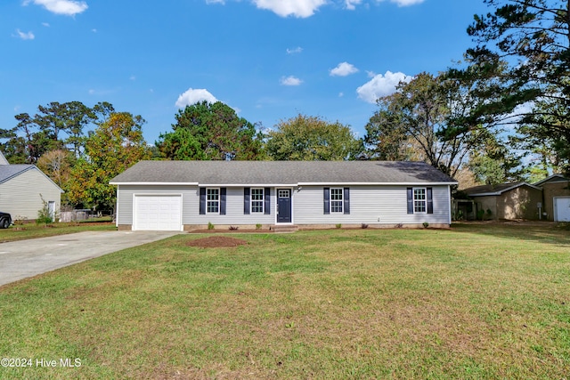 single story home featuring a front yard and a garage