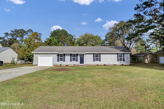 1912 Paulette Rd, Morehead City, NC 28557 - single story home featuring an attached garage, driveway, and a front lawn