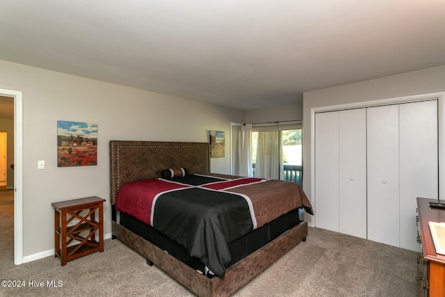 carpeted bedroom featuring a closet