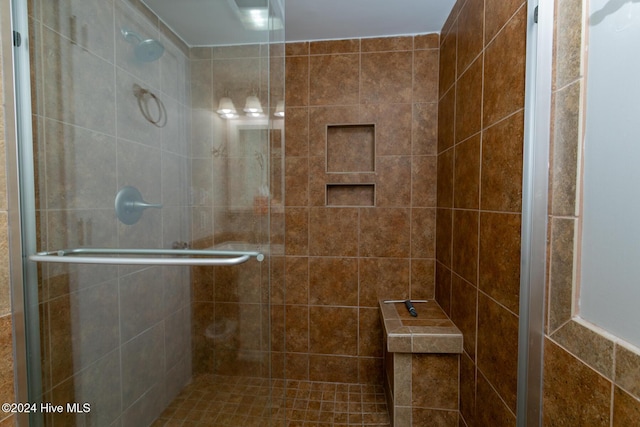 bathroom featuring a stall shower